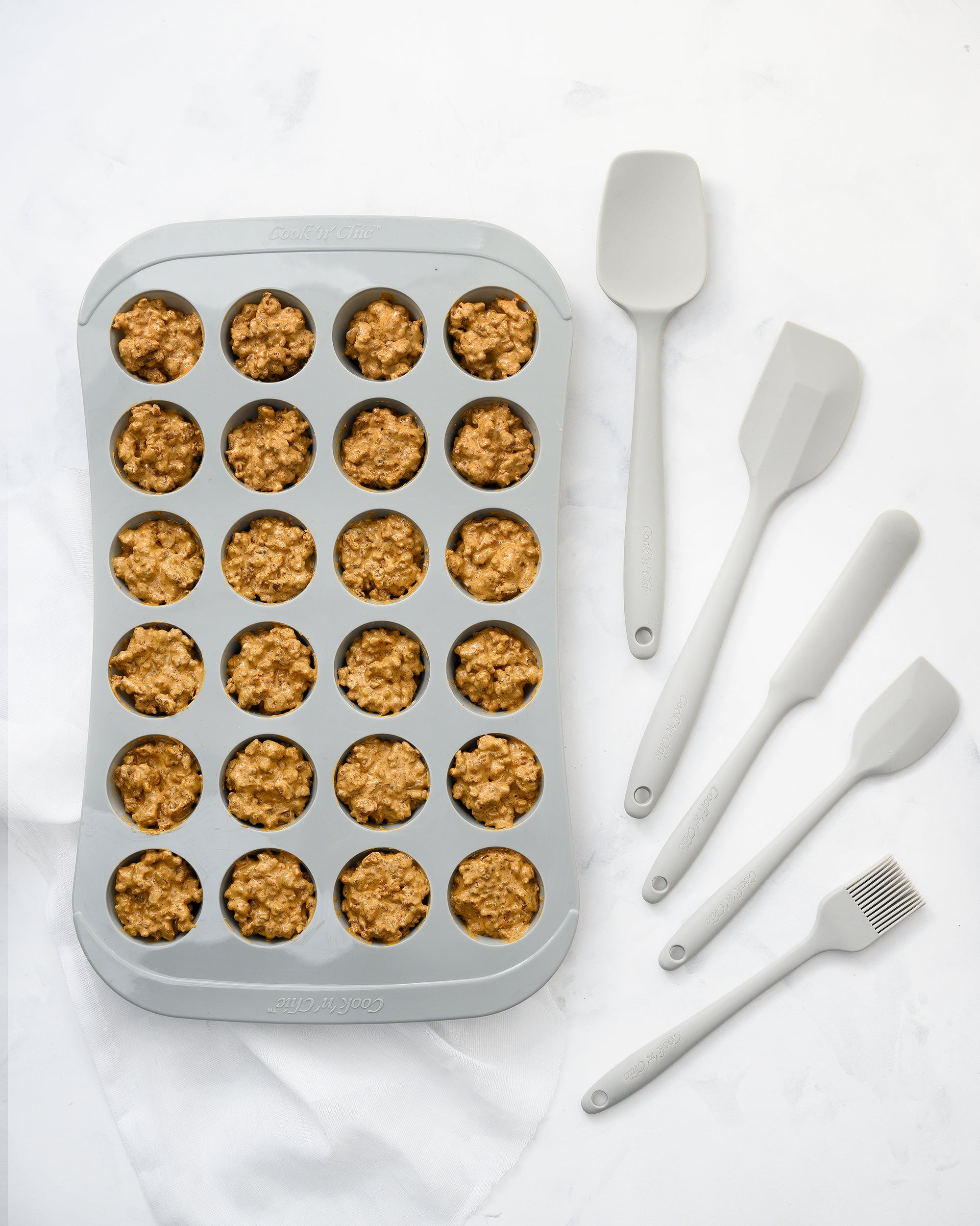 cook 'n' chic premium professional non-stick reusable quick release easy to clean eco friendly silicone cupcake muffin pan and cooking set utensils made of genuine siliconePRIME and strong steel metal inner core